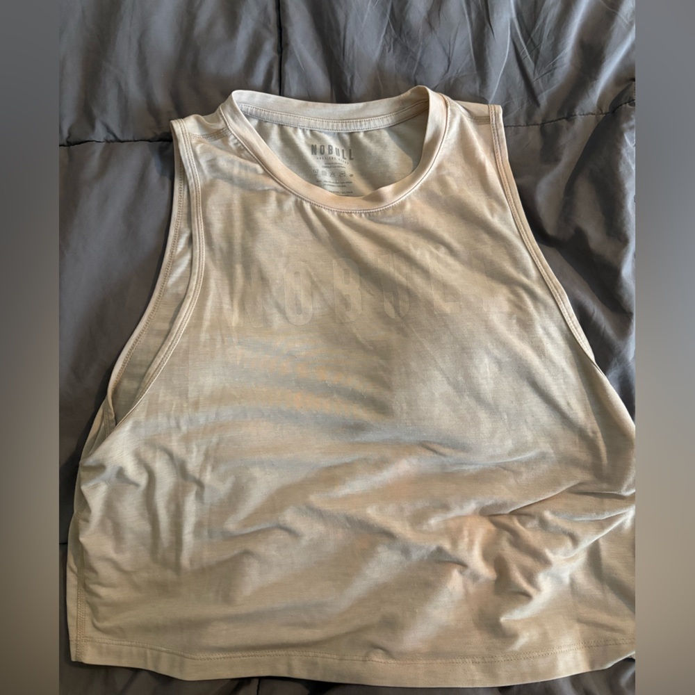 NOBULL women’s Crop Top, Size Medium, a light really light tan color.